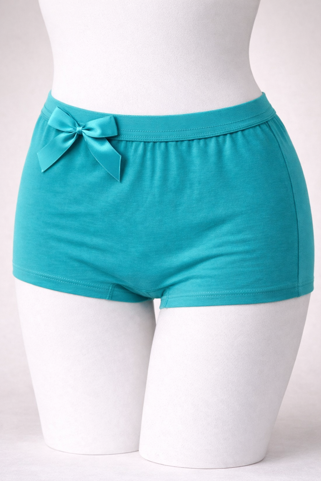 شورت نخی پادار کش پهن ساده رنگ فیروزه ای زنانه برند الماس